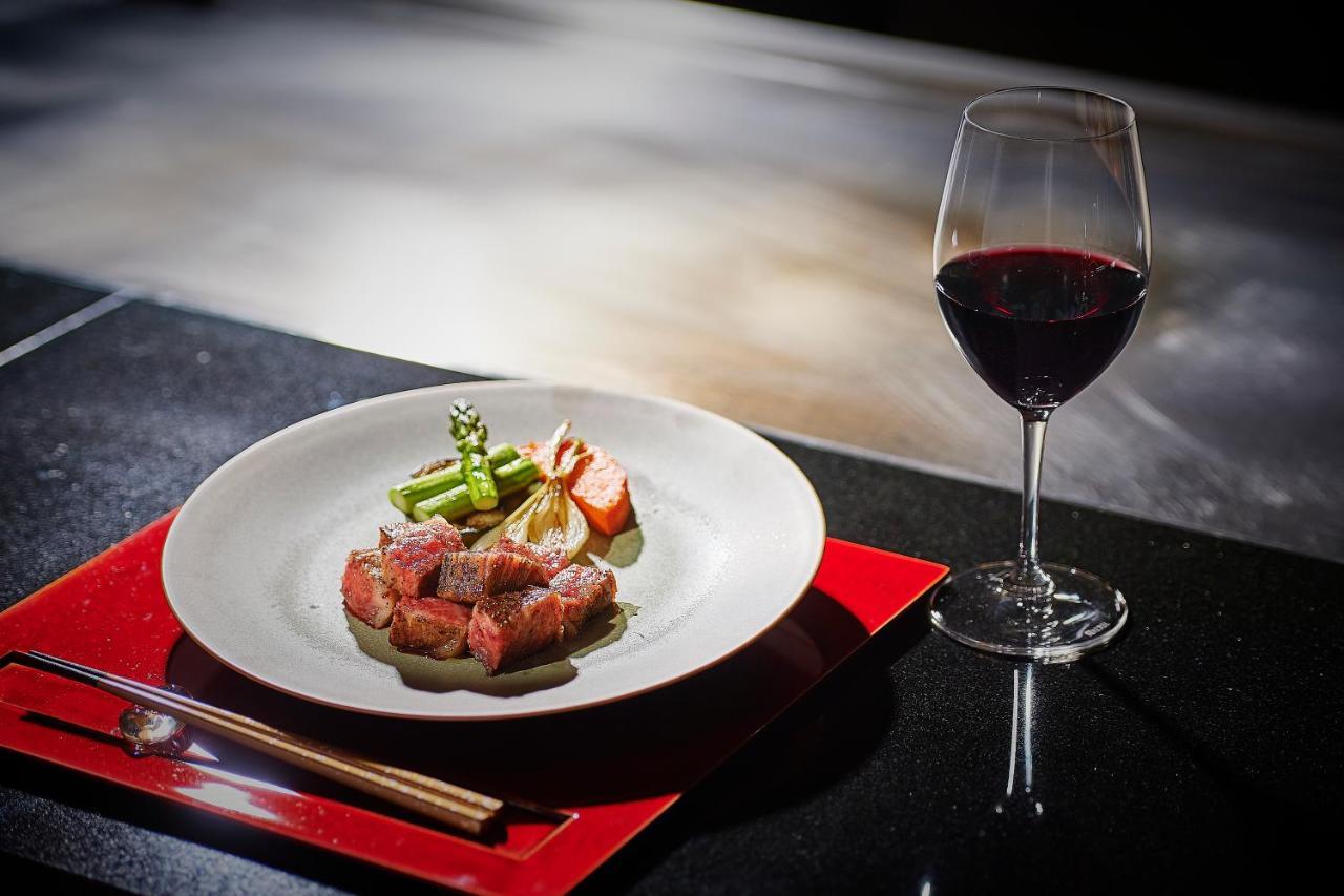 The Gate Hotel Tokyo By Hulic Bagian luar foto A wine glass